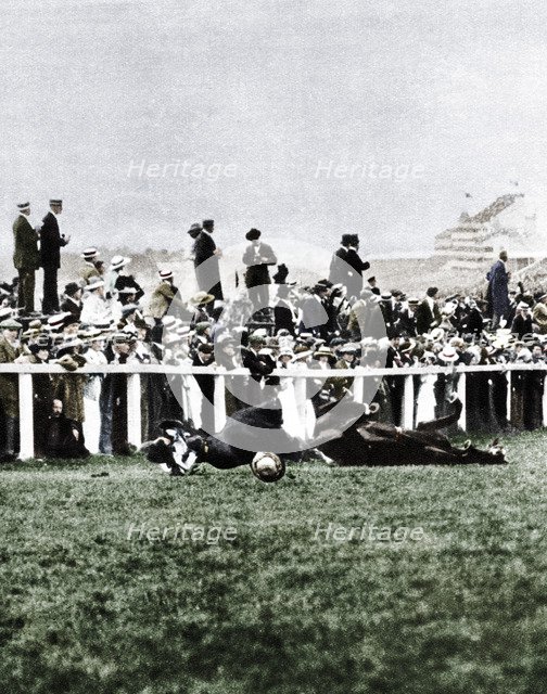 Emily Davison throwing herself in front of the King's horse during the Derby, Epsom, Surrey, 1913. Artist: Unknown.