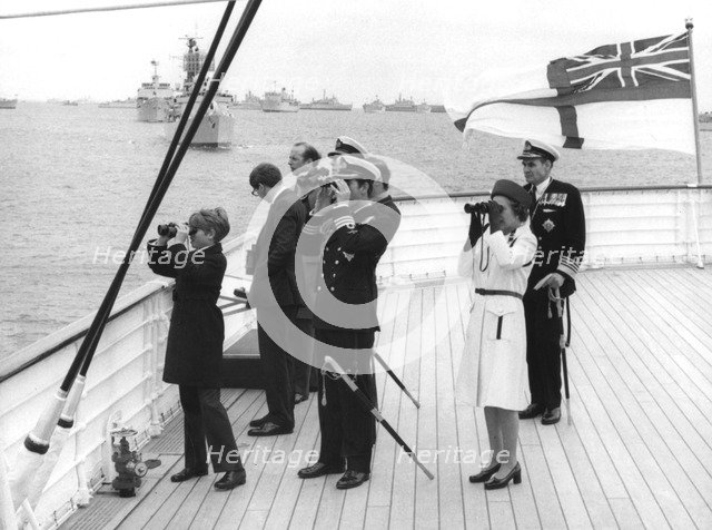 Queen Elizabeth II reviews the fleet at Spithead, 29th June 1977.  Creator: Unknown.