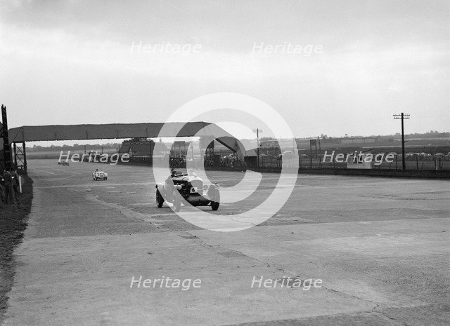 Bentley and Frazer-Nash BMW racing at Brooklands, 1938 or 1939. Artist: Bill Brunell.