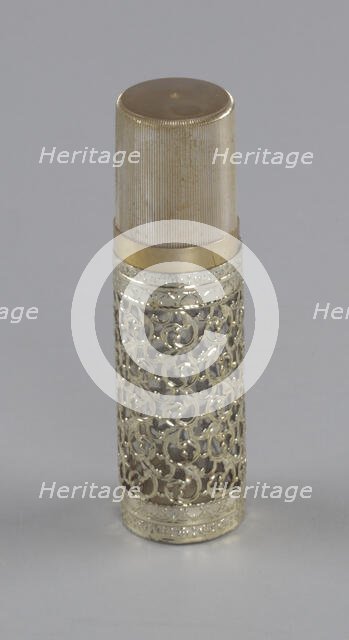 Gold and glass perfume bottle from Mae's Millinery Shop, 1941-1994. Creator: Anne Paree.