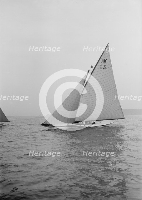 The 7 Metre 'Ancora' (K3) sailing close-hauled, 1913. Creator: Kirk & Sons of Cowes.