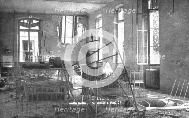 ' "La Guerre a L'Allemande"; Un angle de la salle de l'hopital de la Maternite, ou un obus..., 1918. Creator: Unknown.