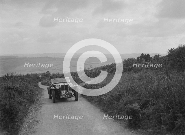 MG TA of WC Kendrick competing in the MCC Torquay Rally, 1938. Artist: Bill Brunell.