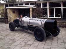 Jackie Stewart at the wheel of a 1920 Sunbeam 350hp. Artist: Unknown