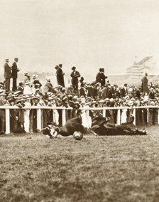 Emily Davison throwing herself in front of the King's horse during the Derby, Epsom, Surrey, 1913. Artist: Unknown