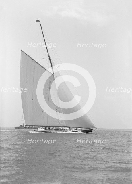 America's Cup challenger 'Shamrock IV' sailing without topsail, 1914. Creator: Kirk & Sons of Cowes.