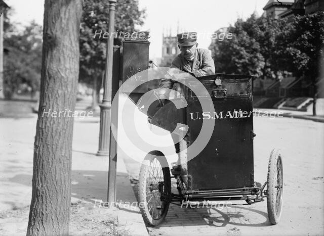 Post office Department - Motor Cycle Postman, 1912. Creator: Harris & Ewing.