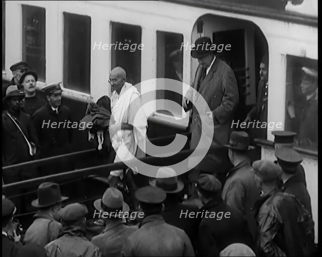 The Party of Mohandas K Gandhi (Mahatma) disembarks in London..., 1931. Creator: British Pathe Ltd.