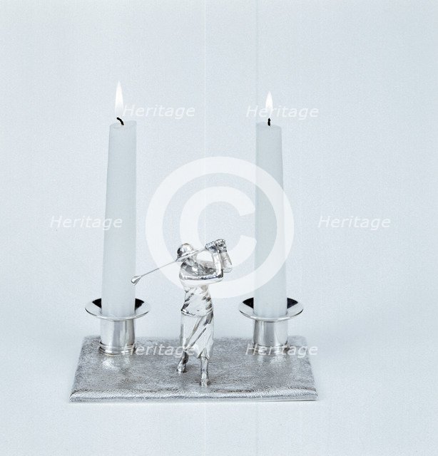 Silver candleholder with female golfer figure, 1930s. Artist: Unknown