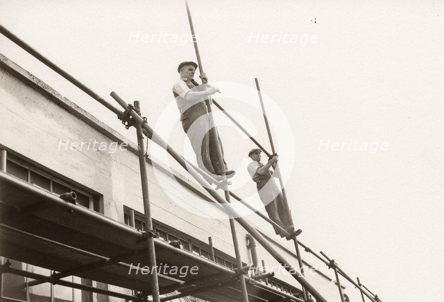 Scaffolders erecting scaffolding, 1951. Artist: Unknown