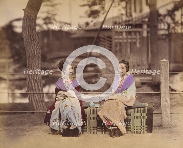 [Two Japanese Women Sitting on a Bench], 1870s. Creator: Unknown.