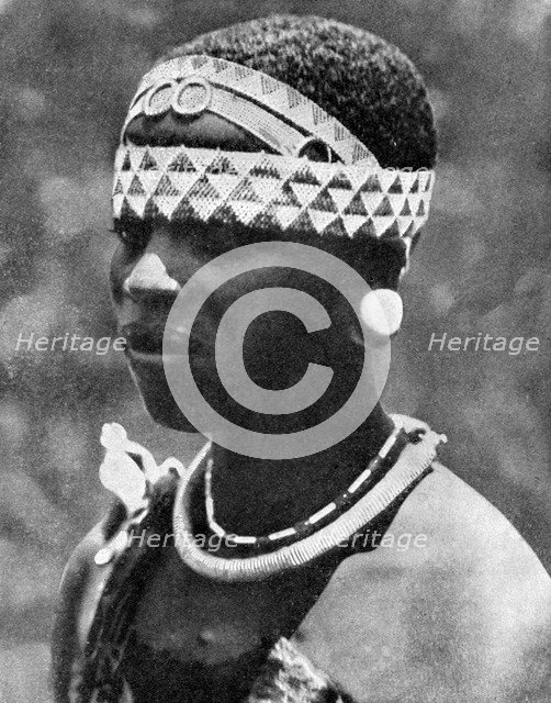 The wife of an Angoni chieftain, Mozambique, Africa, 1936.Artist: Wide World Photos