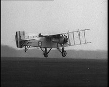 Male British Pilot Taking Off On a Large Plane, 1920s. Creator: British Pathe Ltd.