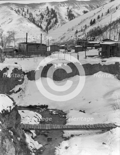 View of company-owned houses, Utah coal town, Consumers, near Price, Utah, 1936. Creator: Dorothea Lange.