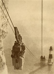 'The Lighthouse Builders', c1930. Creator: J. Weston & Son.