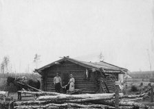 Homesteaders and their home, between c1900 and c1930. Creator: Unknown.