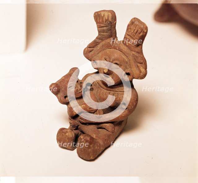 Pottery Rattle of woman holding child, Mexico. Axtec, late Post-Classic Period, 1300-1520. Artist: Unknown.