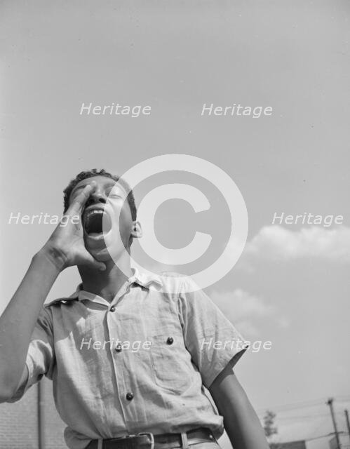 Boy at the playground, Frederick Douglass housing project, Anacostia, D.C.  , 1942. Creator: Gordon Parks.