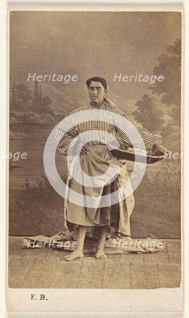 Genre portrait of an unidentified woman holding a basket, 1870-1875. Creator: Ferdinand Berillon.