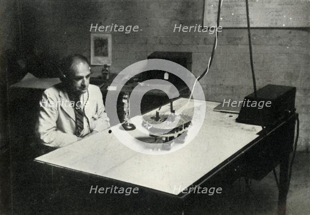 Control desk at an RAF flight training school, 1941. Creator: Charles Brown.