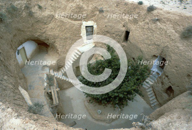 Pit-dwelling in Tunisia. Artist: Unknown