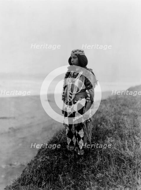 On the shores of the Pacific-Tolowa, c1923. Creator: Edward Sheriff Curtis.