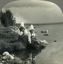 'Lake Siljan Mirrors the Past in the Life of the Present. Rattvik Costumes in Dalecarlia, Sweden', c Creator: Unknown.