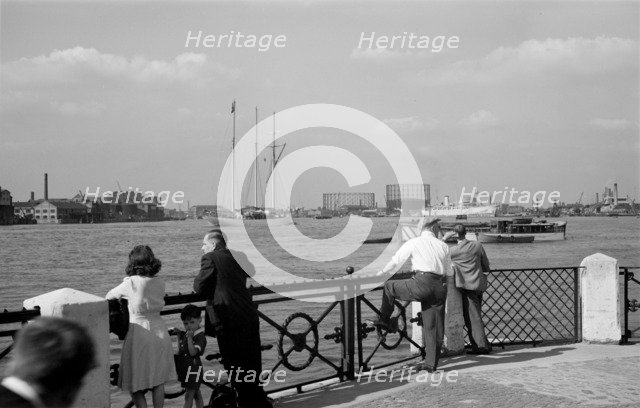 People watching traffic on the Thames, Greenwich, London, c1945-c1965. Artist: SW Rawlings