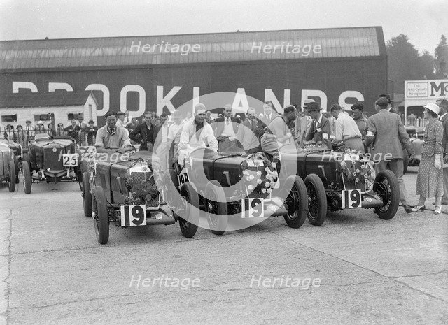 Three MG Magnas at the LCC Relay Grand Prix, Brooklands, Surrey, 1933. Artist: Bill Brunell.