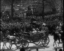 Crowd Watching the Silver Jubilee Parade of George V, His Majesty The King, 1936. Creator: British Pathe Ltd.