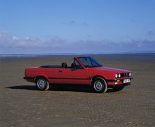 1987 BMW 325i convertible. Artist: Unknown.