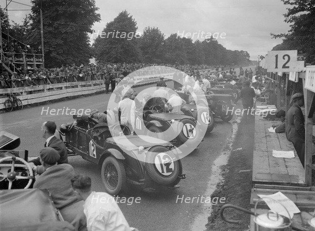 Cars before the start of the Irish Grand Prix, Phoenix Park, Dublin, 1930. Artist: Bill Brunell.
