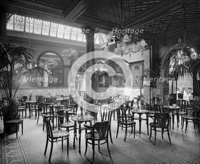 The winter garden in the Monico Restaurant. Shaftesbury Avenue, Westminster, London, 1915. Artist: Bedford Lemere and Company