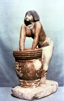 Woman brewing beer, Ancient Egyptian tomb model. Artist: Unknown