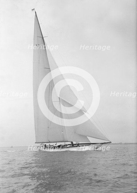 The 23-metre cutter 'Astra' sailing close-hauled, 1933. Creator: Kirk & Sons of Cowes.