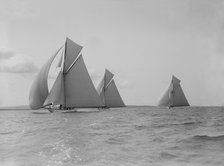 The 19-metre 'Maraquita', 'Corona' & 'Octavia' racing downwind, 1912. Creator: Kirk & Sons of Cowes.