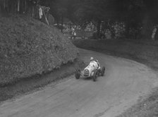 Austin 7 of LP Driscoll competing in the MAC Shelsley Walsh Speed Hill Climb, Worcestershire, 1935. Artist: Bill Brunell.