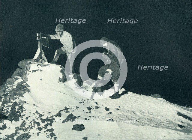 'Dr. Wilson and Lieut. Bowers Reading The Ramp Thermometer', c1911, (1913). Artist: Herbert Ponting.