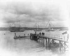 New York - Oyster Bay, Long Island Yacht Club: looking past pier to sailing yachts at anchor, 1905. Creator: Unknown.