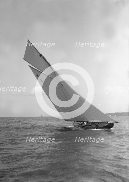 'Verbena' (H2), a gaff rig 8 Metre, sailing close-hauled, 1911. Creator: Kirk & Sons of Cowes.