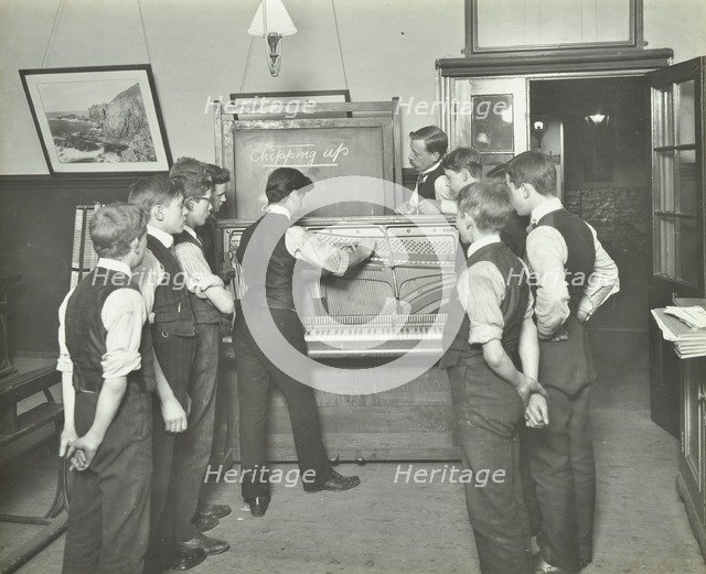 Constructing a piano, Benthal Road Evening Institute, London, 1914. Artist: Unknown.
