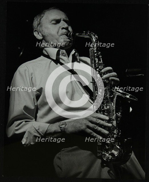 Saxophonist Bruce Turner playing at The Stables, Wavendon, Buckinghamshire. Artist: Denis Williams