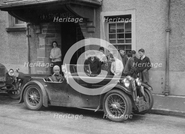 Kitty Brunell in her MG Magna outside the Stag Hotel, Edinburgh, RSAC Scottish Rally, 1932. Artist: Bill Brunell.
