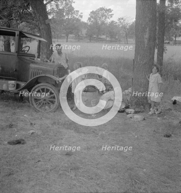 Migrant family from Oklahoma in Texas, 1936. Creator: Dorothea Lange.