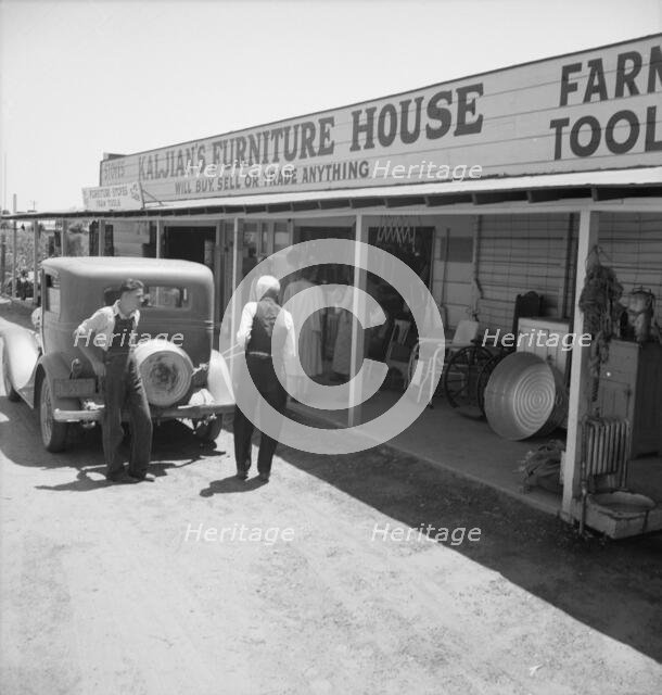 Outskirts of Fresno, on U.S. 99, 1939. Creator: Dorothea Lange.