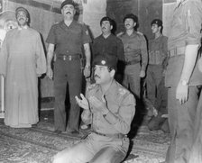 Saddam Hussein praying, Karbala, Iraq, 1985. Artist: Unknown