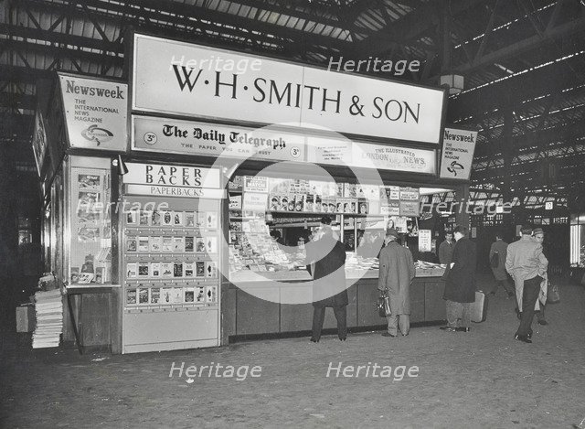 WH Smith's bookstall at Waterloo Station, Lambeth, London, 1960. Artist: Unknown.