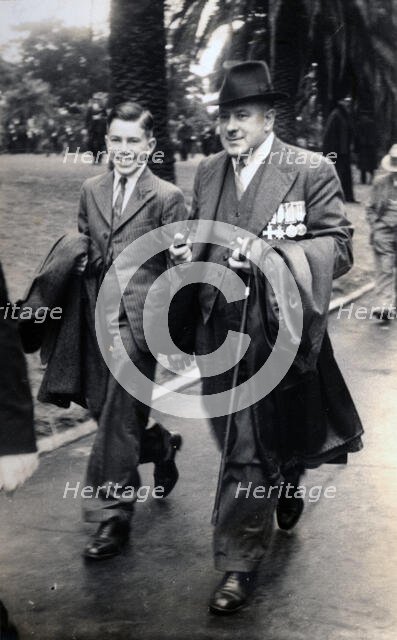 Frank Page with his son, Thomas. Creator: Unknown.