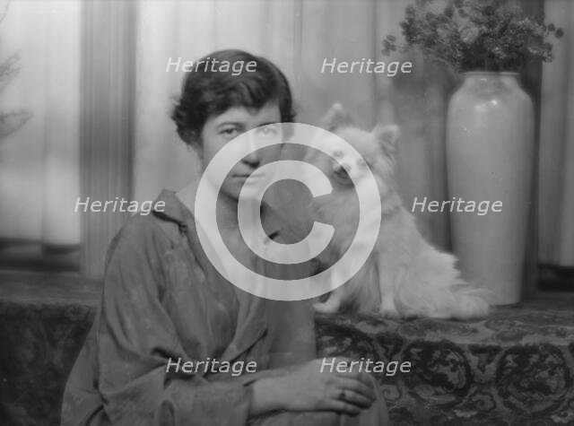Stimson, Henry B., Mrs., with dog, portrait photograph, 1915. Creator: Arnold Genthe.