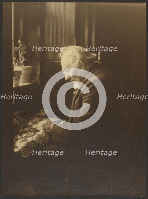 Portrait of a Man Working at Desk, 1895-1943. Creator: Louis Fleckenstein.